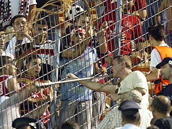  Football hooligans with baseb...
